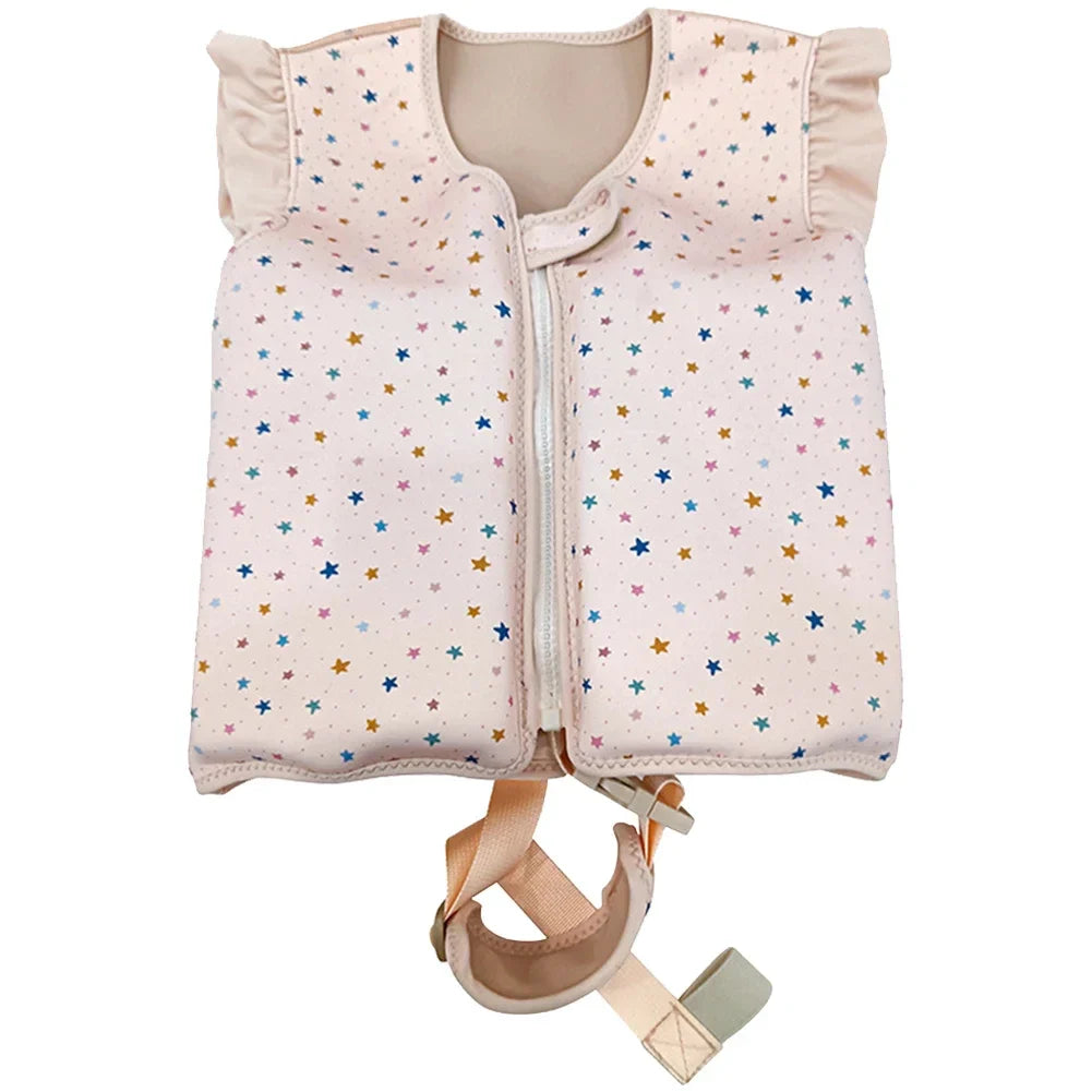 Baby vest with star pattern and straps on a white background